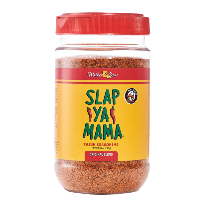 Front of Slap Ya Mama Cajun Seasoning jar showing vibrant yellow label with logo, original blend, and 907g pack size.