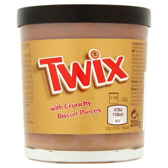 Front of Twix Chocolate Caramel Spread jar showing the Twix logo, crunchy biscuit pieces label, and 200g pack size.