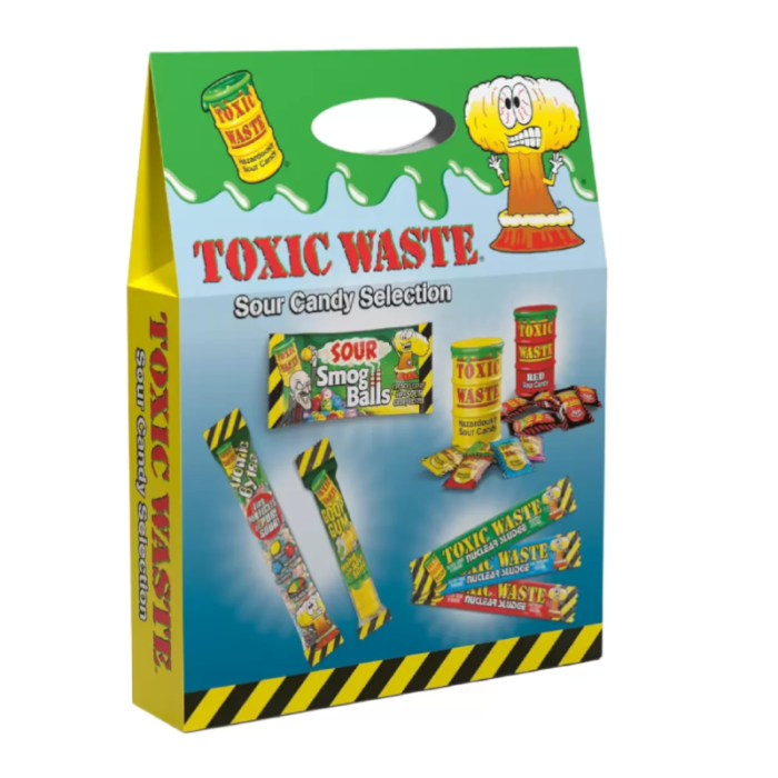 Front of Toxic Waste Sour Candy Selection Pack showing vibrant green and yellow packaging, logo, and assorted sour candy items in a 295g pack.