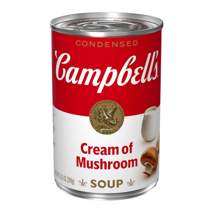 Front of Campbell's Cream Of Mushroom Soup can featuring bold red logo, cream of mushroom label, and pack size of 298g