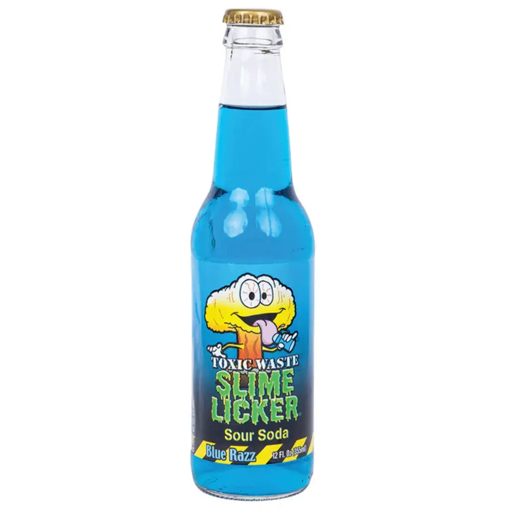 Front of a Toxic Waste Slime Licker Soda bottle displaying the character with blue raspberry flavour label and 355ml size.
