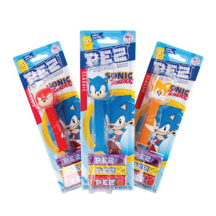 Front of Pez Sonic The Hedgehog Blister Pack showing three dispensers featuring Sonic, Knuckles, and Tails, accompanied by colourful candy (24 count)