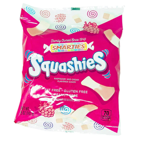 Front of Smarties Squashies bag featuring bright pink packaging, raspberry and cream flavour label, and 141g pack size.