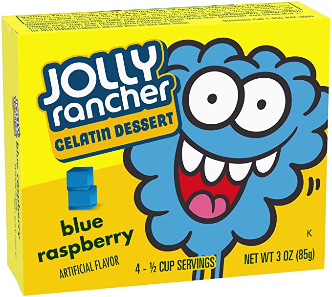 Front of Jolly Rancher Blue Raspberry Gelatin Mix box showing bold logo, blue raspberry flavour label, and cartoon character illustration with pack size (85g)