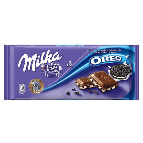 Front of Milka Oreo chocolate bar showing purple packaging, the Milka logo, Oreo cookie pieces, and a 100g size label