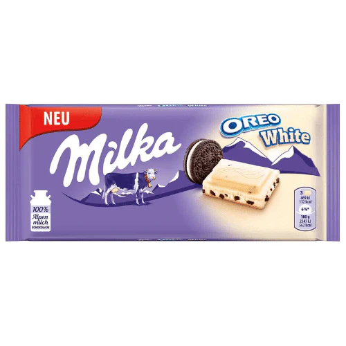 Front of Milka Oreo White chocolate bar package showing the Milka logo, Oreo cookie pieces, and 100g size.