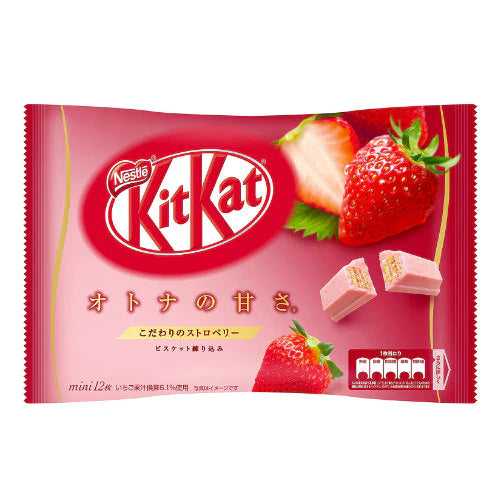 Front of Kit Kat Mini Strawberry (Japan) package featuring the pink logo, strawberry imagery, and mini chocolate bars (135g pack)