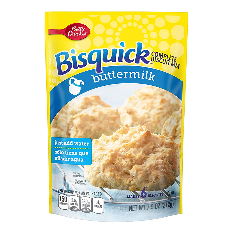 Front of Bisquick Buttermilk Complete Biscuit Mix package showing yellow background, blue text, and image of fluffy biscuits (212g pack)