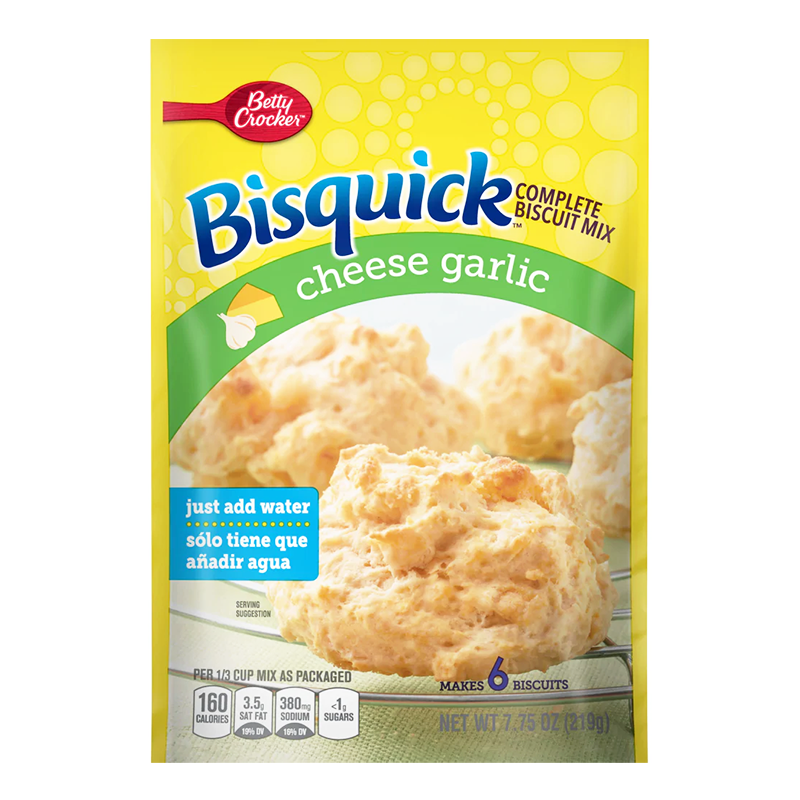 Front of Bisquick Cheese Garlic Complete Biscuit Mix package showing bright yellow label, cheese and garlic graphics, and details for just adding water (219g pack)