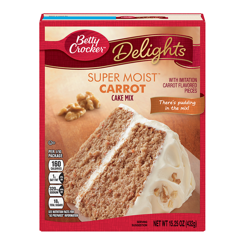 Front of Betty Crocker Super Moist Carrot Cake Mix box featuring red design, carrot flavor label, and serving suggestion of a sliced cake (375g pack)