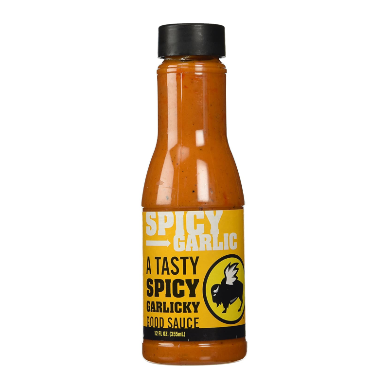 Front of Buffalo Wild Wings Spicy Garlic Sauce bottle displaying bold yellow label with 'Spicy Garlic' text and details, 355ml pack size