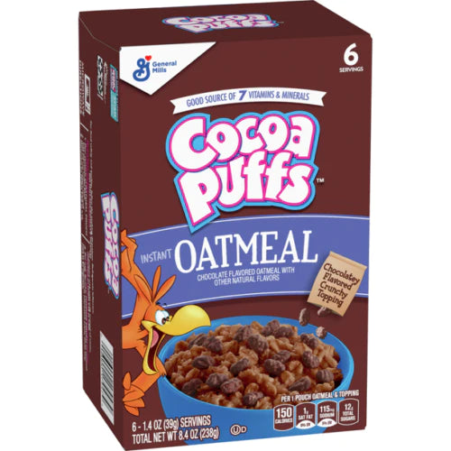 Front of Cocoa Puffs Instant Oatmeal box featuring the logo, chocolate flavour, and serving suggestion with a bowl of oatmeal (238g pack)