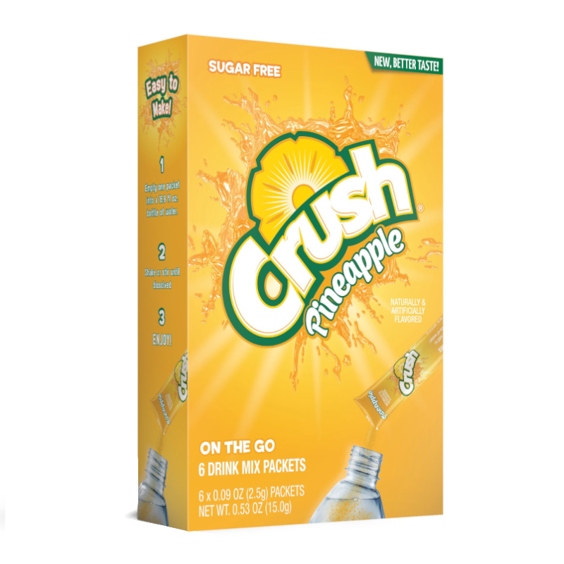 Front of Crush Pineapple Singles To Go box showing bright yellow packaging, pineapple flavour label, and details for drink mix packets (15g total)