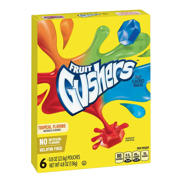 Front of Fruit Gushers Tropical box featuring the bright yellow logo, tropical flavours label, and vibrant splash design (136g pack)