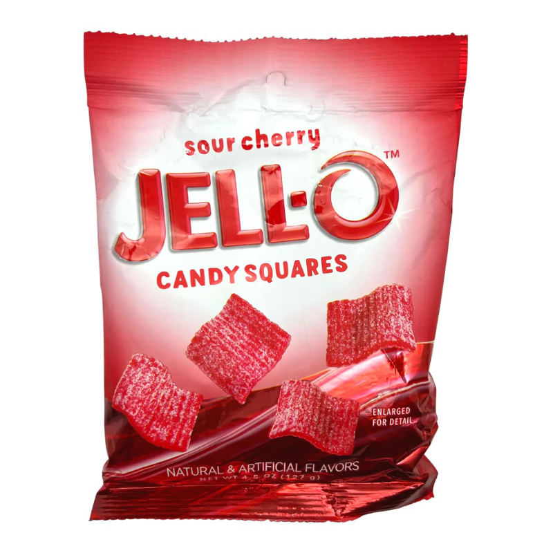 Front of Jell-O Sour Cherry Candy Squares bag showing vibrant red packaging, logo, and colourful chewy candy pieces (127g pack)