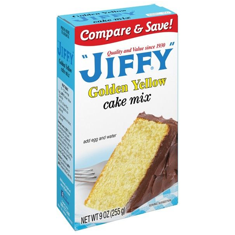 Front of Jiffy Golden Yellow Cake Mix box showing brand logo, cake mix title, and a sliced cake image (255g pack)
