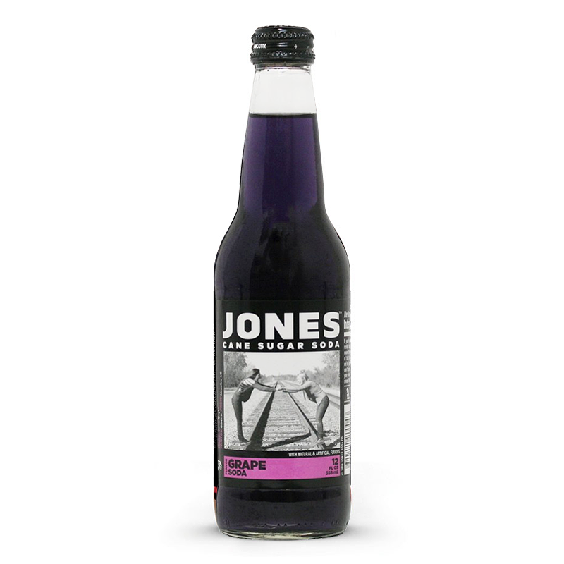 Front of Jones Soda Grape Soda bottle showing bold logo, grape flavour label, and vibrant purple soda (355ml)