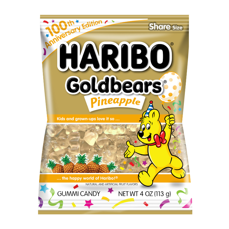 Front of Haribo 100th Anniversary Pineapple Gold Bears bag showing vibrant yellow packaging with pineapple gummies and the Haribo logo (113g pack)