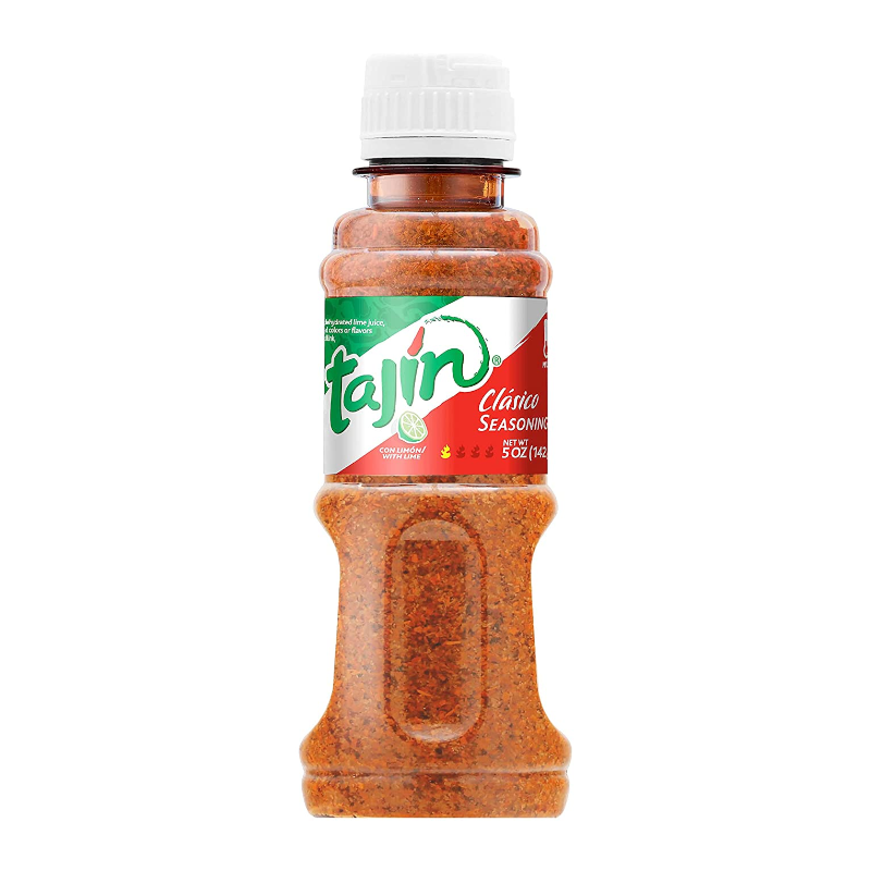 Front of Tajin Clasico Fruit and Snack Seasoning bottle showing logo, lime and chili flavour label, and 142g pack size.