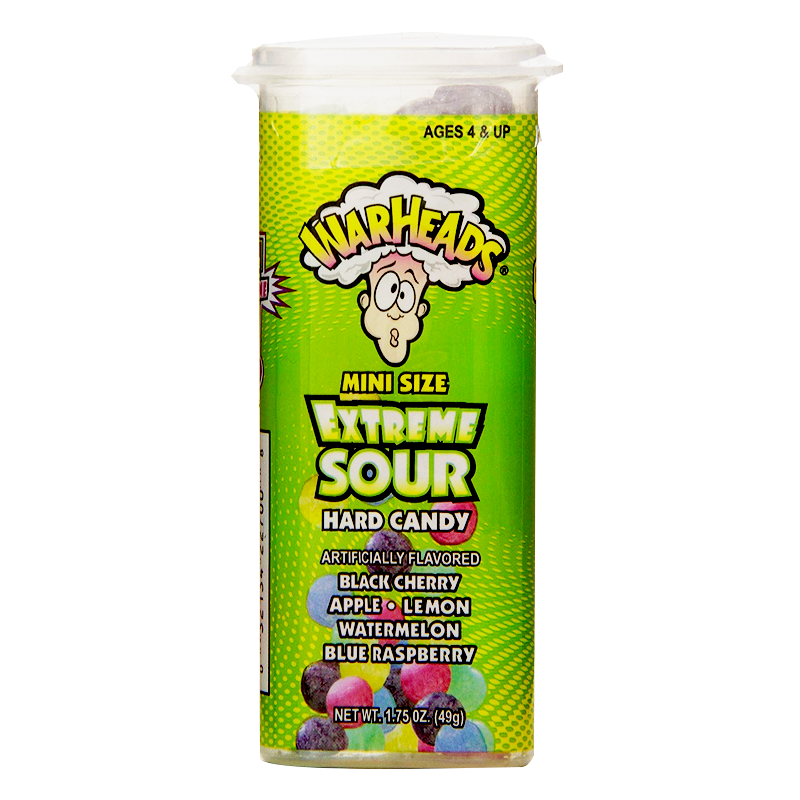 Front of Warheads Mini Size Extreme Sour Hard Candy display showing bright green packaging with the logo, various fruit flavour mentions, and 49g pack size.