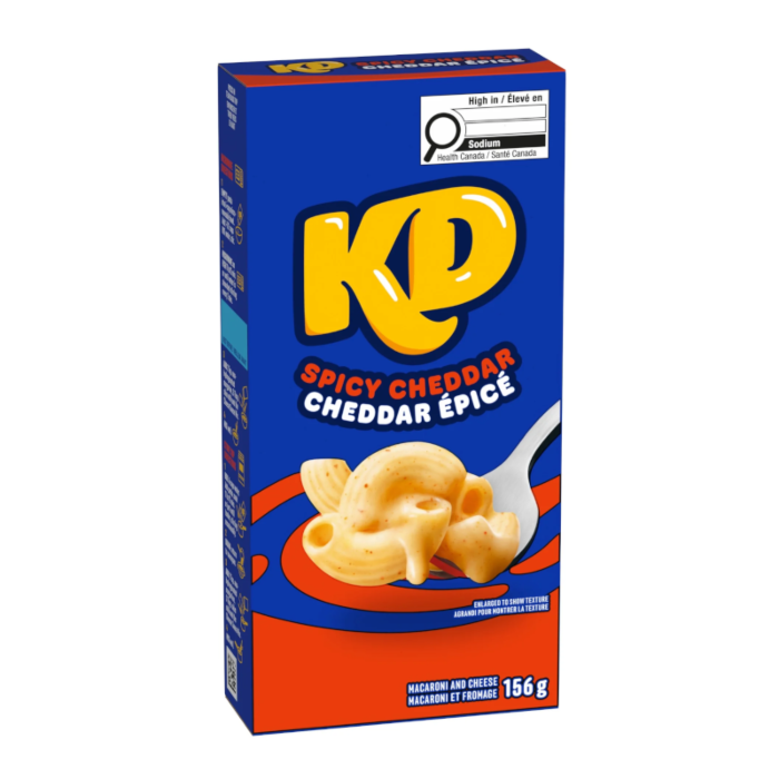 Front of Kraft Mac & Cheese Spicy Cheddar box showing bright logo, spicy cheddar flavour label, and creamy pasta image (204g pack)
