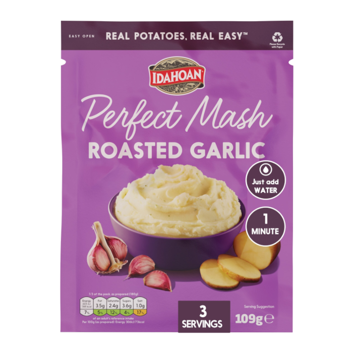 Front of Idahoan Perfect Mash Roasted Garlic pack showing logo, creamy mashed potatoes in a bowl, and garlic cloves (109g pack)