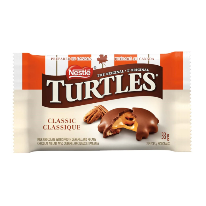 Front of Nestle Turtles package showing the logo, classic label, image of chocolate-covered caramel and pecans, and 33g pack size