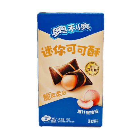 Front of Oreo Peach Cream-Filled Bites box showing logo, peach-flavoured cream-filled treats, and details of 40g pack.
