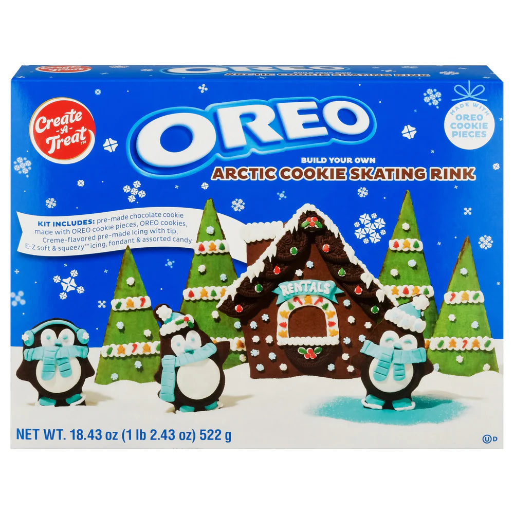 Front of Oreo Arctic Cookie Kit Skating Rink box showing blue packaging with penguin cookie figures, chocolate cookie house, and snowflakes (522g pack)