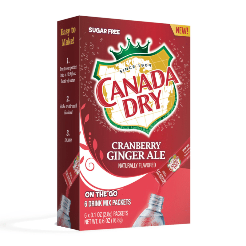 Front of Canada Dry Cranberry Ginger Ale Singles To Go box showing logo, cranberry ginger ale label, and drink mix packet details (16.8g pack)