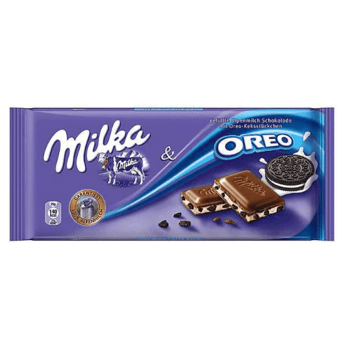 Front of Milka Oreo chocolate bar showing purple packaging, the Milka logo, Oreo cookie pieces, and a 100g size label