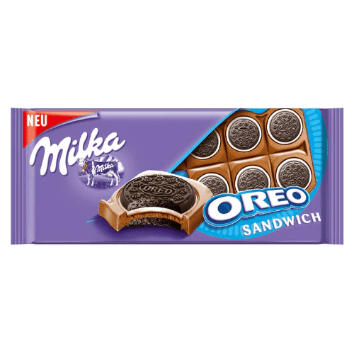 Front of Milka Oreo Sandwich pack showing purple background, Milka logo, Oreo filling, and 92g pack size.